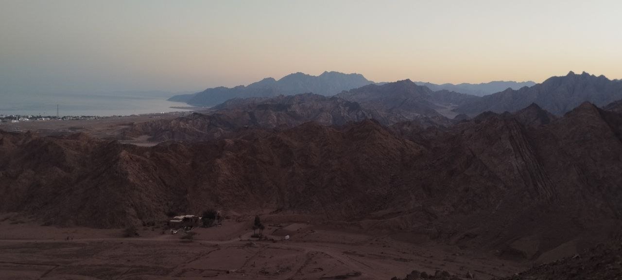 Desert valley at dusk overlooking the coast